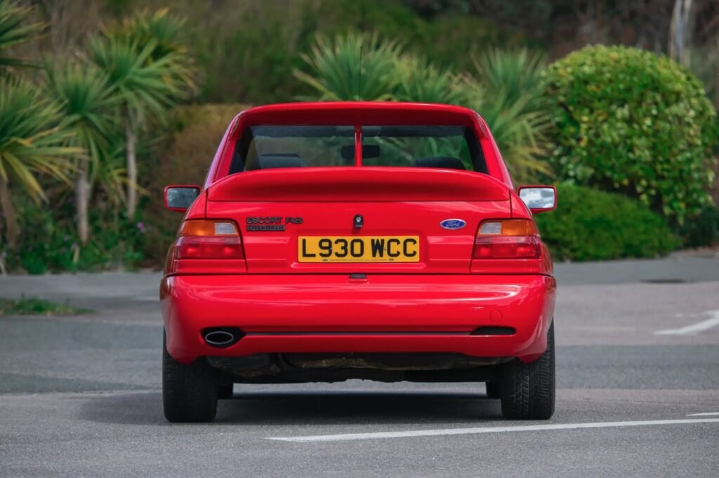 A 1993 Ford Escort RS Cosworth sold for £105,750 in time-warp condition with just 12,530 miles, rare specs and complete original documentation from its sole owner.