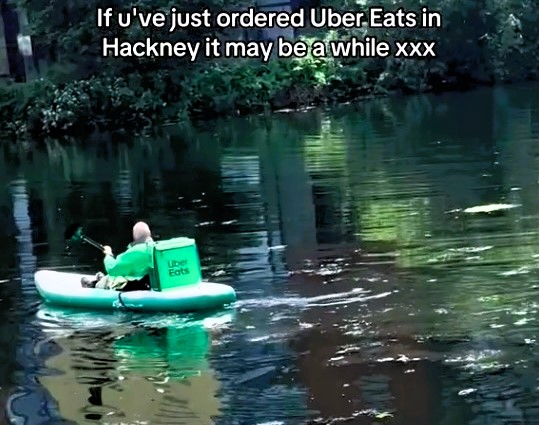 An Uber Eats courier was spotted delivering food by canoe on the River Lea in Hackney, London, amusing onlookers and sparking jokes about eco-friendly and scenic routes.