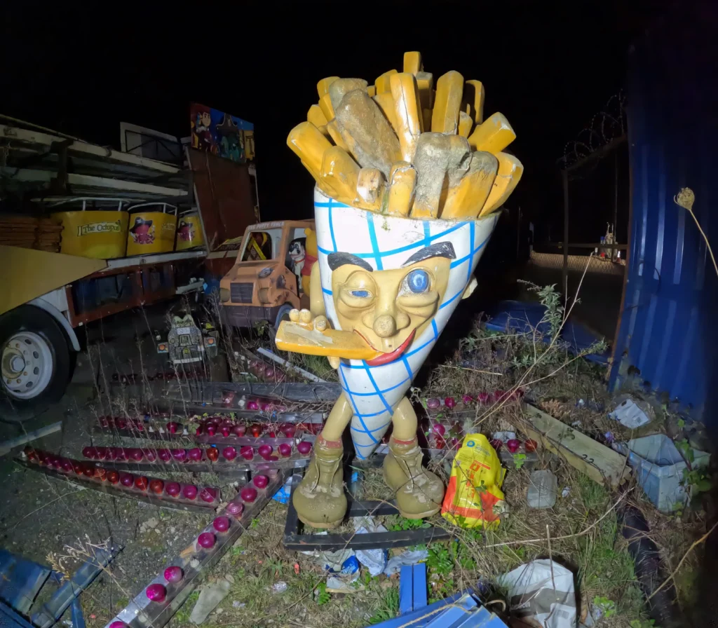 An urban explorer found 60 decaying rides at a creepy abandoned funfair in South Wales - with intact kids' rides, arcade machines and ghost trains lost to time.
