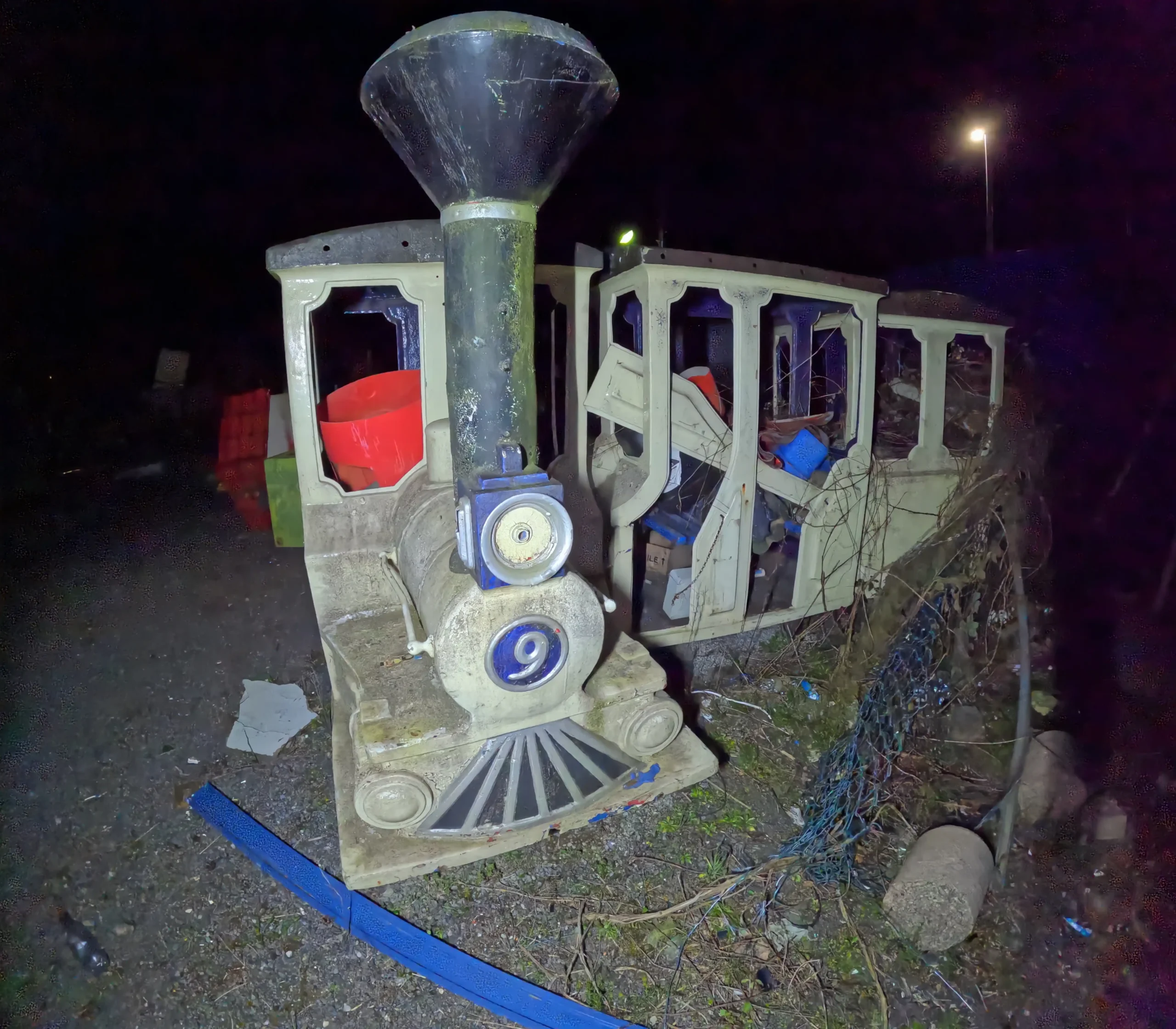 An urban explorer found 60 decaying rides at a creepy abandoned funfair in South Wales - with intact kids' rides, arcade machines and ghost trains lost to time.