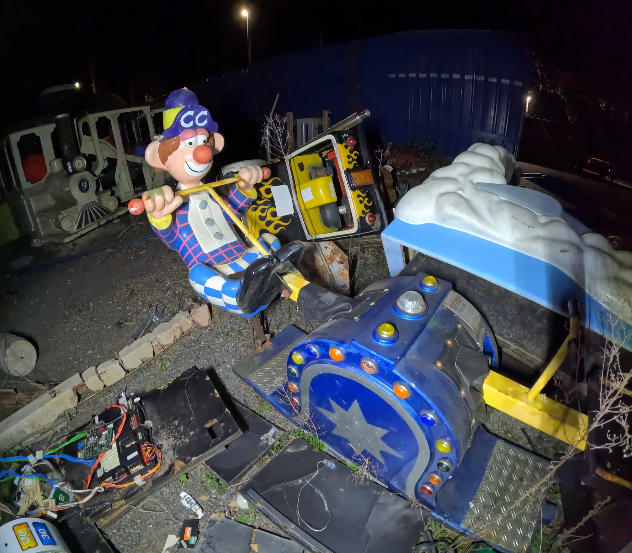 An urban explorer found 60 decaying rides at a creepy abandoned funfair in South Wales - with intact kids' rides, arcade machines and ghost trains lost to time.