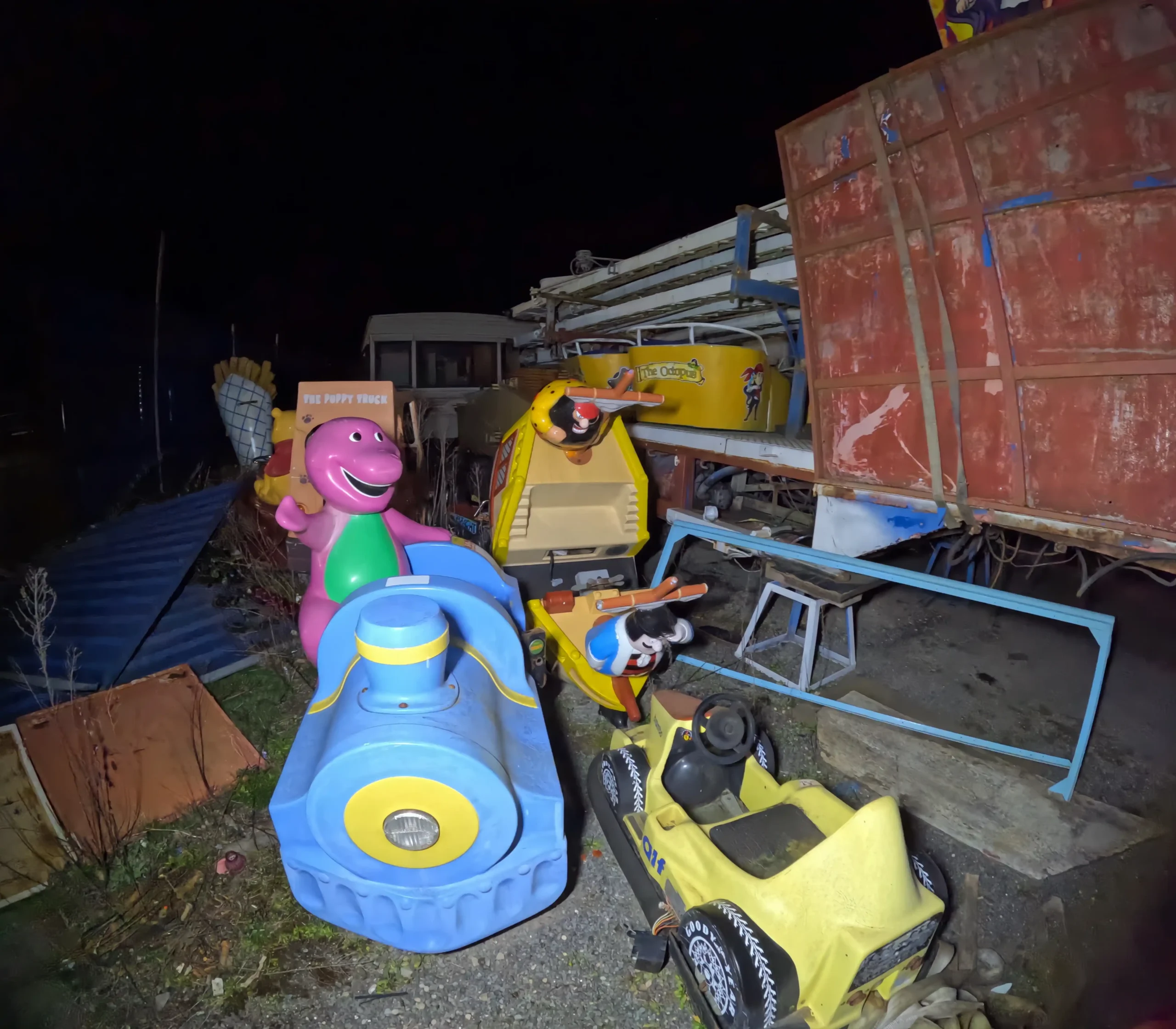 An urban explorer found 60 decaying rides at a creepy abandoned funfair in South Wales - with intact kids' rides, arcade machines and ghost trains lost to time.