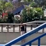 A woman was filmed dangerously crossing Spain's A7 motorway instead of using a nearby footbridge - locals say she does it often and fear a serious accident is imminent.