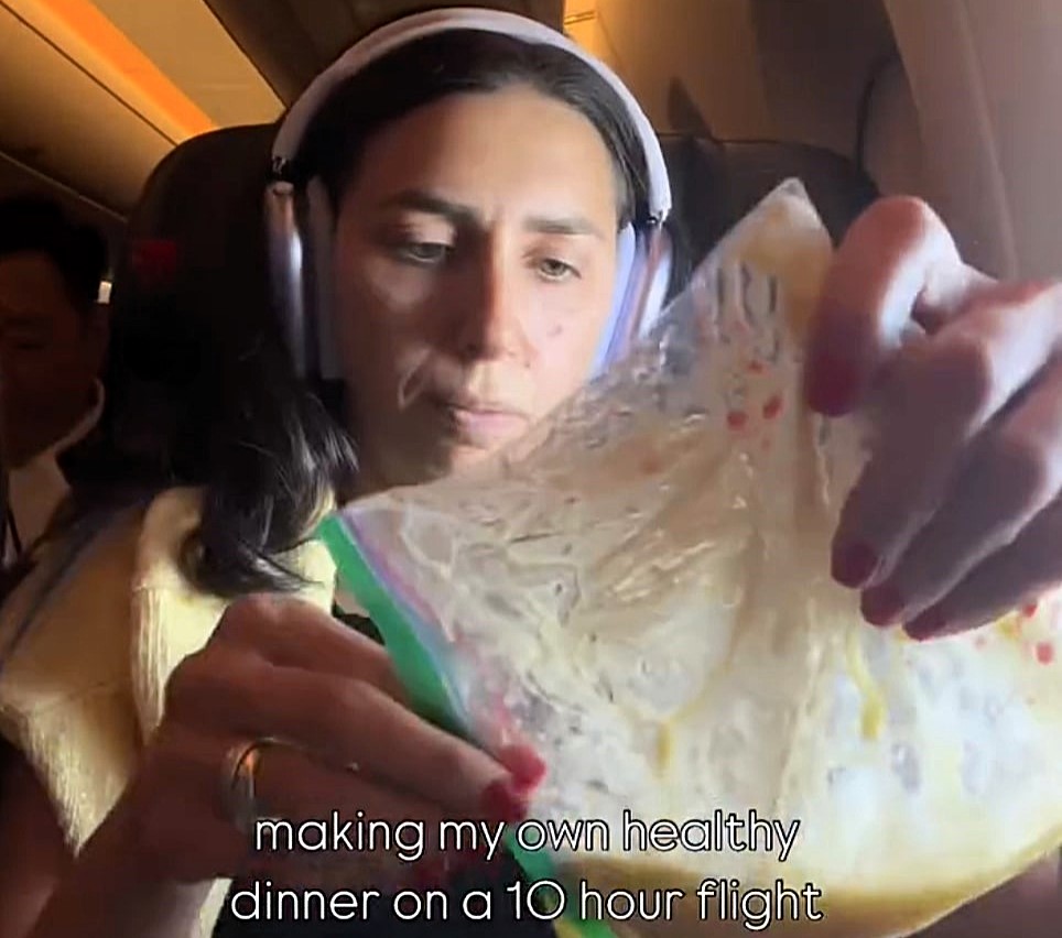A woman went viral for making a salad with boiled eggs mid-flight, sparking social media outrage over airplane etiquette, but she insists her meal was odourless and discreet.