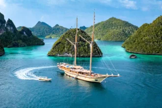 Sail Indonesia aboard Lamima - the world’s largest wooden sailing yacht offering luxury, diving, wellness and bespoke expeditions from £159,000 per week plus tax.