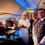 World's tallest woman Rumeysa Gelgi must buy six plane seats and fly on a stretcher due to height and spinal implants - calls for better accessibility worldwide.