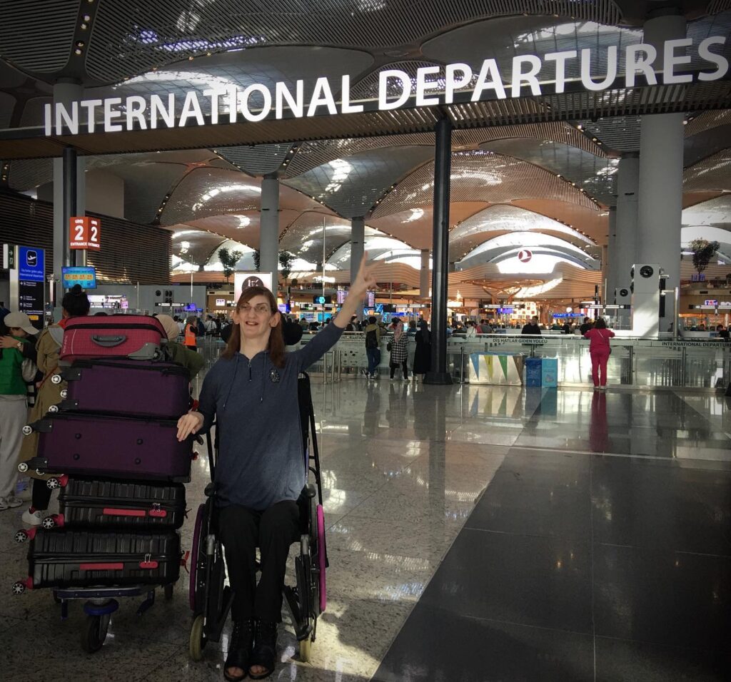 World's tallest woman Rumeysa Gelgi must buy six plane seats and fly on a stretcher due to height and spinal implants - calls for better accessibility worldwide.