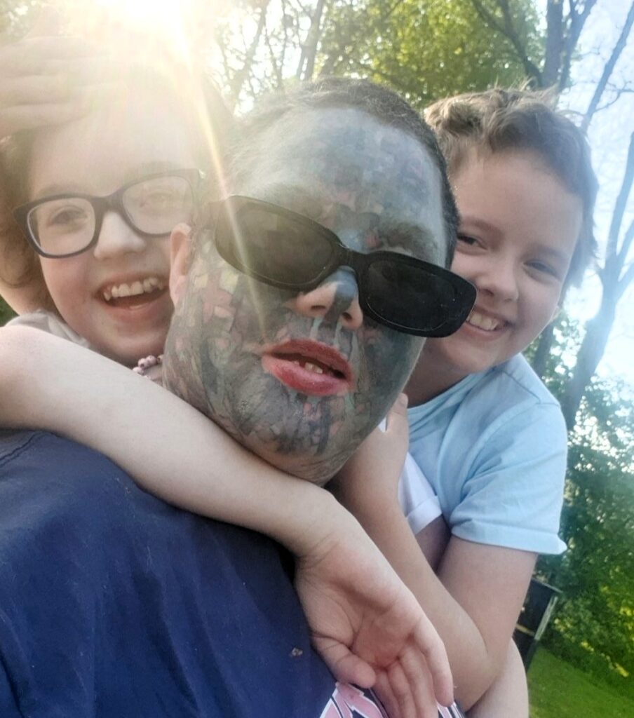 Melissa Sloan, known as Britain’s most tattooed mum, is skipping her kids’ sports day after a teacher told her to hide due to her face tattoos, saying public judgment isolates her.