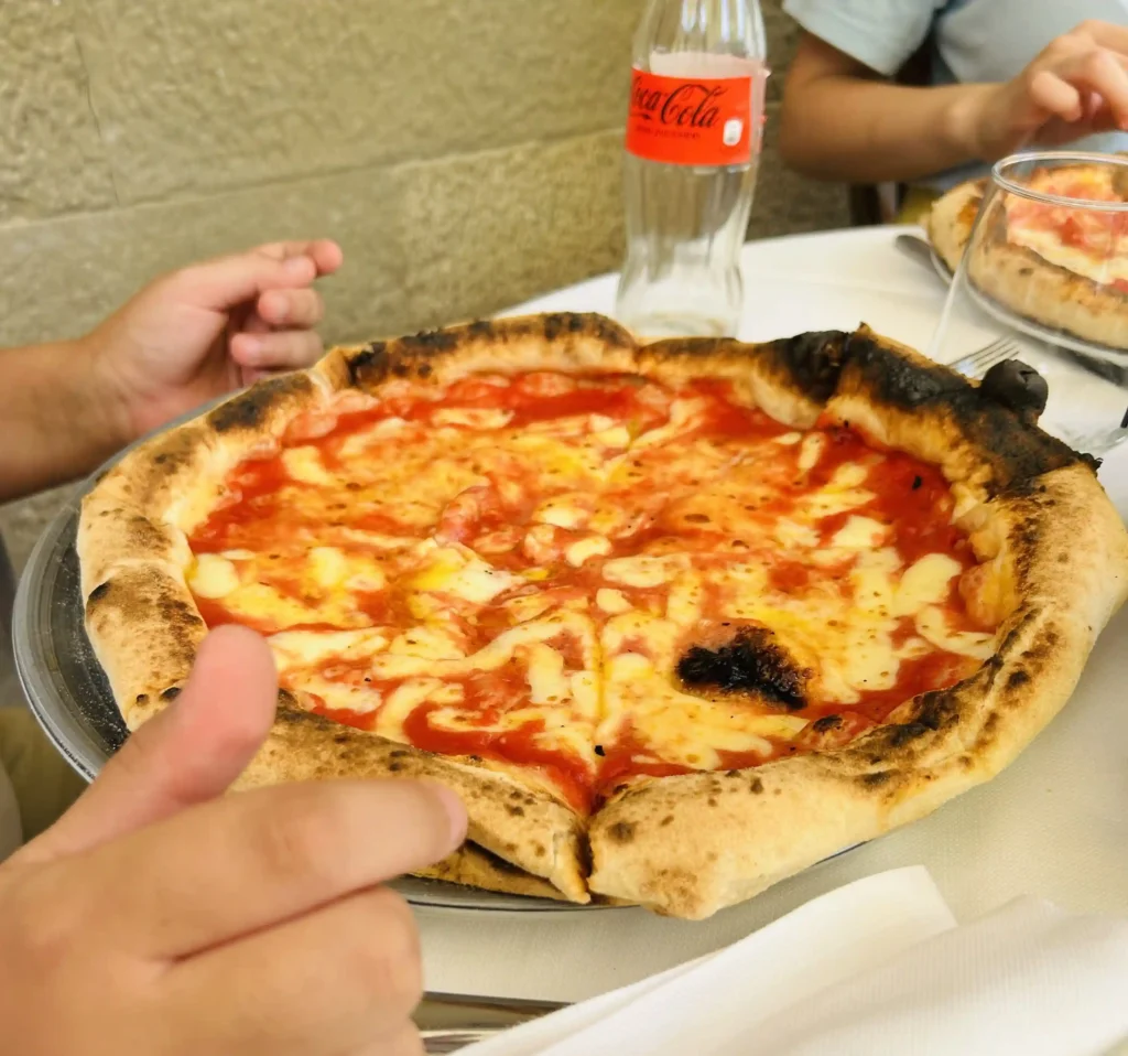 A savvy mum took her kids to Italy for lunch for just £212 - cheaper than a UK theme park day out - enjoying pizza, gelato and sightseeing all in time for bed.