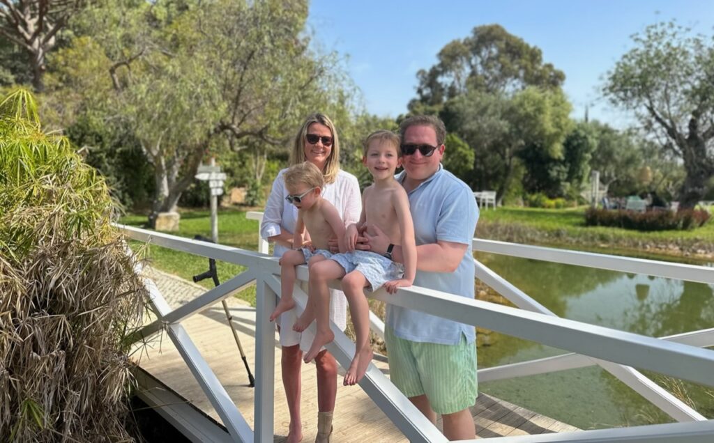 Amelia Peckham, a disabled mum once called selfish for having kids, proudly books summer off to be with her sons - proving her critics wrong with love and presence.