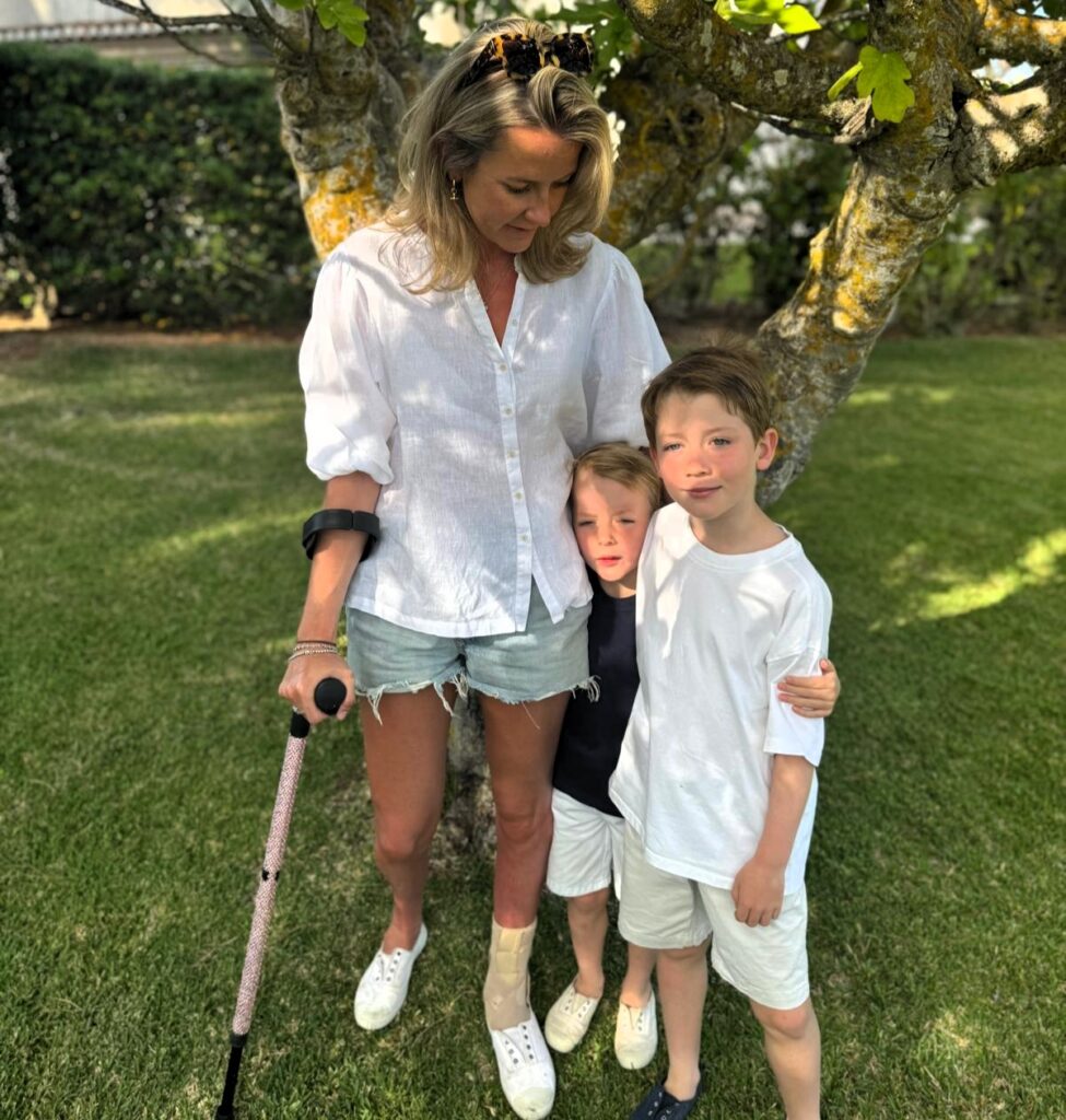 Amelia Peckham, a disabled mum once called selfish for having kids, proudly books summer off to be with her sons - proving her critics wrong with love and presence.