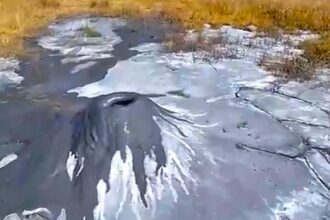 A 60cm mud volcano dubbed the world’s smallest has emerged in a Peruvian village, sparking intrigue and environmental concern as experts investigate its unusual activity.