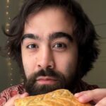 An American in London tried Greggs for the first time but called the pastry “bread,” sparking backlash from Brits. Despite the mix-up, he rated the vegan roll best.
