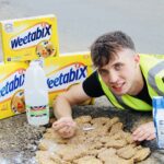 Angry Brit fills Gloucestershire pothole with Weetabix to protest road conditions - cyclists cheer as stunt draws attention to council inaction and sparks viral reaction.