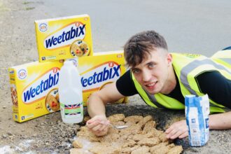 Angry Brit fills Gloucestershire pothole with Weetabix to protest road conditions - cyclists cheer as stunt draws attention to council inaction and sparks viral reaction.