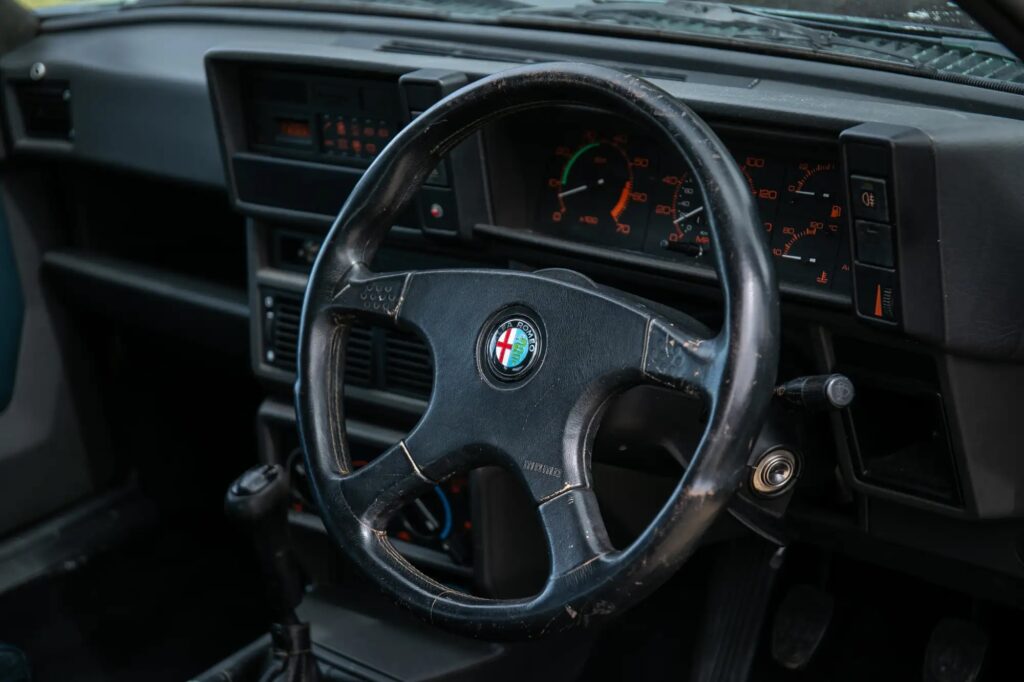 Jeremy Clarkson’s £450 Alfa Romeo from Top Gear is up for auction at £15,000, complete with Skoda Green paint, TV battle scars, and no MOT since 2017.