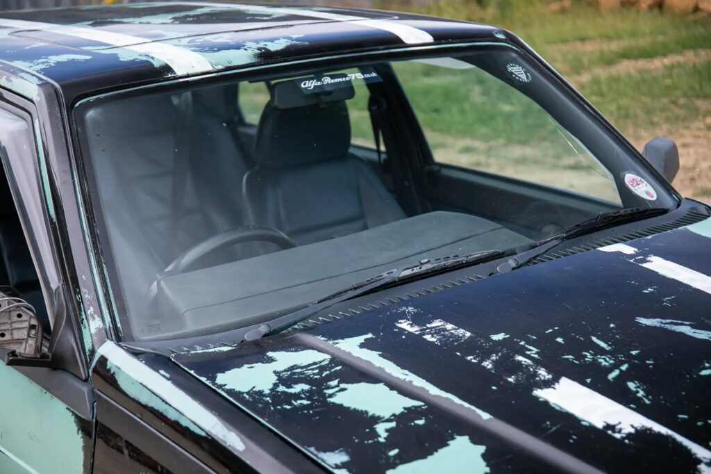 Jeremy Clarkson’s £450 Alfa Romeo from Top Gear is up for auction at £15,000, complete with Skoda Green paint, TV battle scars, and no MOT since 2017.