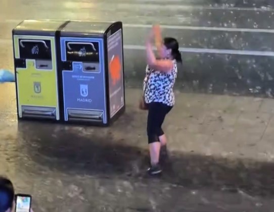 A dancing diva stole the spotlight at Madrid Pride, grooving in ankle-deep rain as the crowd roared - her joyful moves upstaged no-show star Karol G in a viral moment.