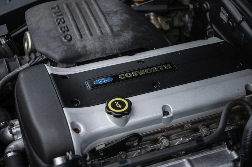 A rare 1996 Ford Escort RS Cosworth Lux with just 22,744 miles and one owner is up for auction at £90,000, boasting 150mph performance and collector appeal.