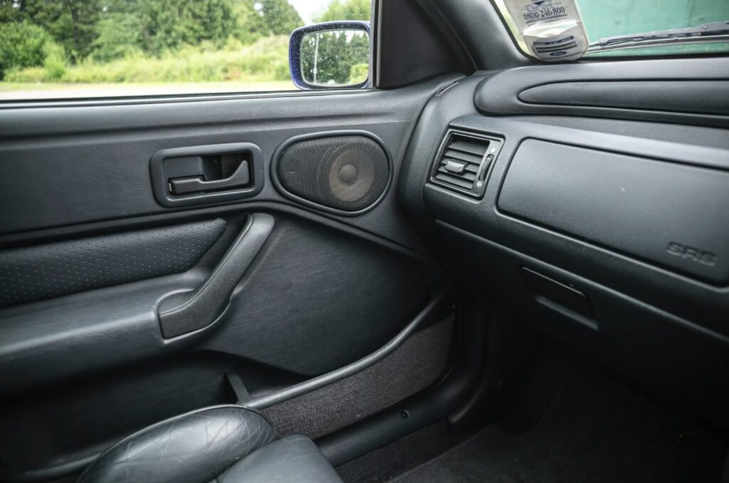 A rare 1996 Ford Escort RS Cosworth Lux with just 22,744 miles and one owner is up for auction at £90,000, boasting 150mph performance and collector appeal.