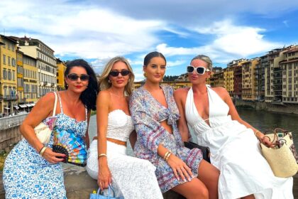 Four sisters flew to Italy for a birthday trip only to find their hotel booking was for 2026, ending up in a hot basement room but laughing through the unexpected adventure.