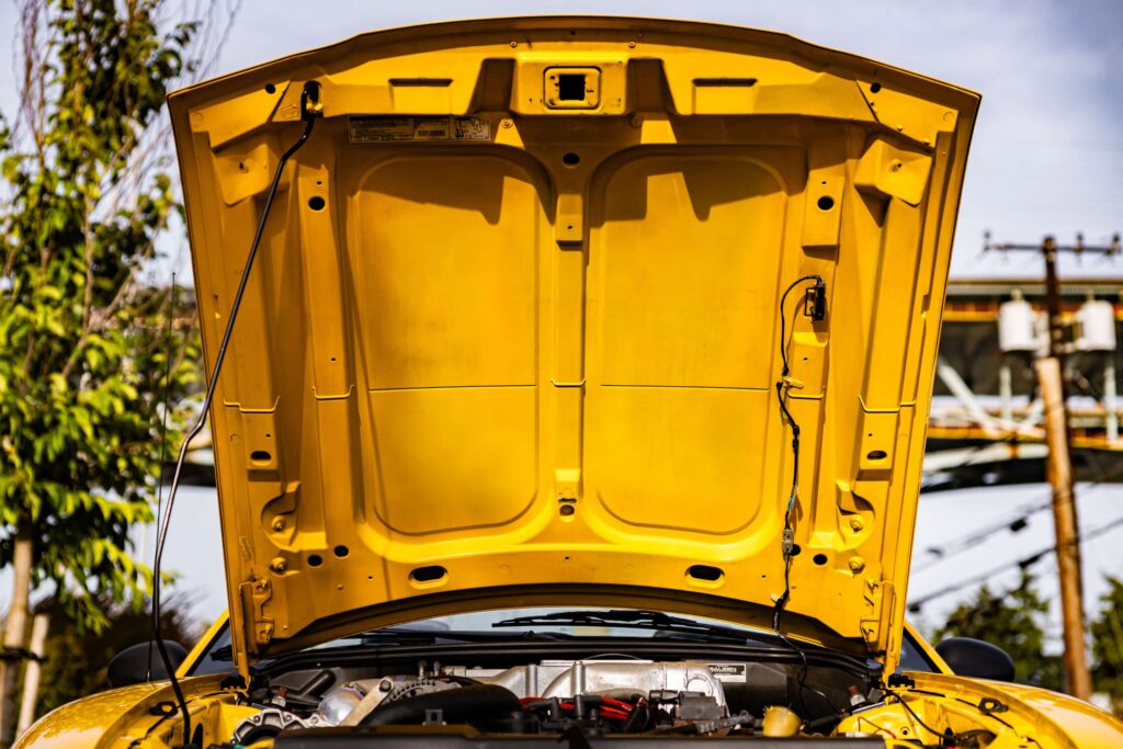 George Foreman’s 1995 Saleen Mustang, with only 728 miles and 510bhp, is up for sale at £9,300. This rare canary yellow convertible was rarely driven and heavily upgraded.