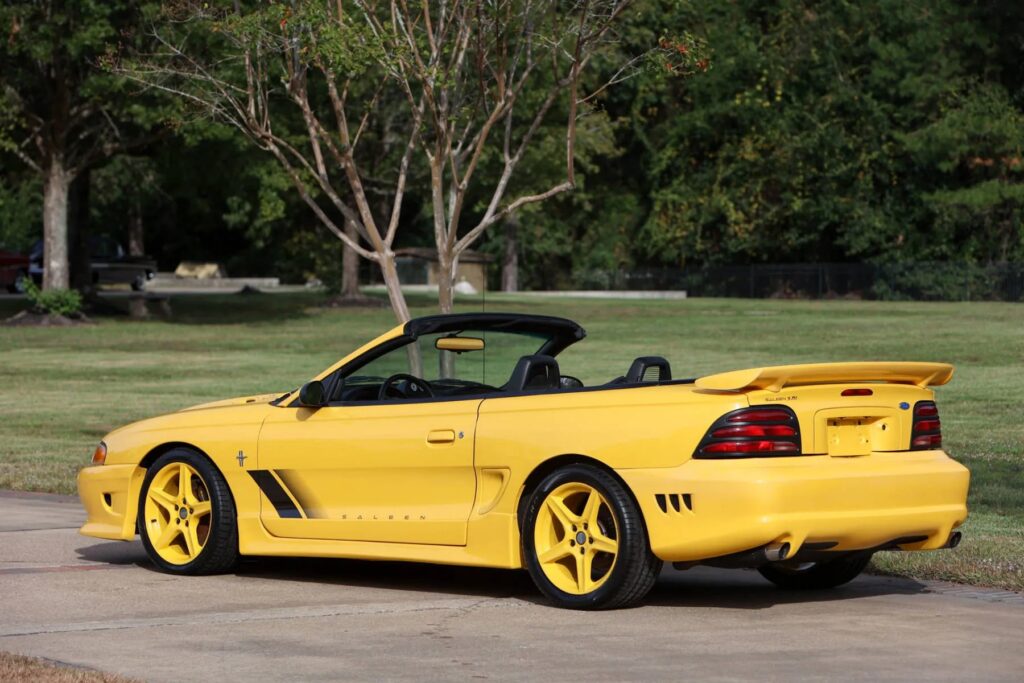 George Foreman’s 1995 Saleen Mustang, with only 728 miles and 510bhp, is up for sale at £9,300. This rare canary yellow convertible was rarely driven and heavily upgraded.
