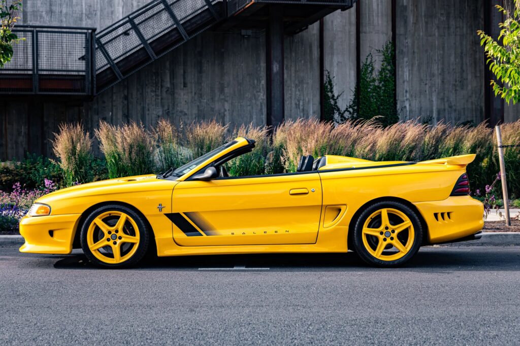 George Foreman’s 1995 Saleen Mustang, with only 728 miles and 510bhp, is up for sale at £9,300. This rare canary yellow convertible was rarely driven and heavily upgraded.