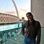 A woman living next to Wembley Stadium enjoys free concerts by Taylor Swift and Dua Lipa from her balcony, calling the high rent worth it for the view and vibrant atmosphere.