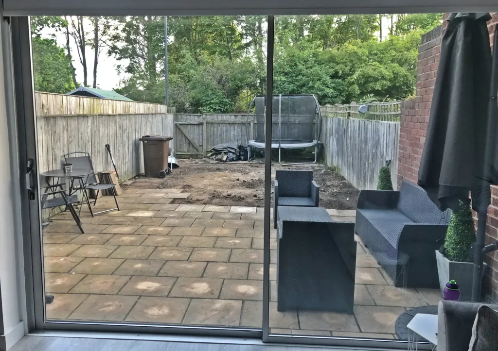 Single mum transforms garden for £1,127 using ChatGPT and grit after £10k quote - inspires kids and social media with DIY drive, ditching TV for power tools.