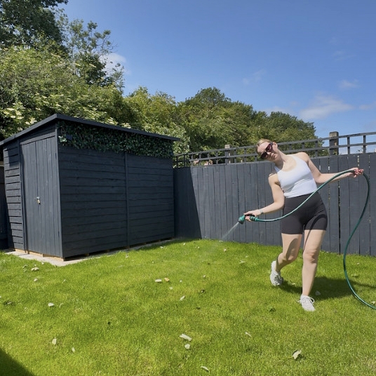 Single mum transforms garden for £1,127 using ChatGPT and grit after £10k quote - inspires kids and social media with DIY drive, ditching TV for power tools.