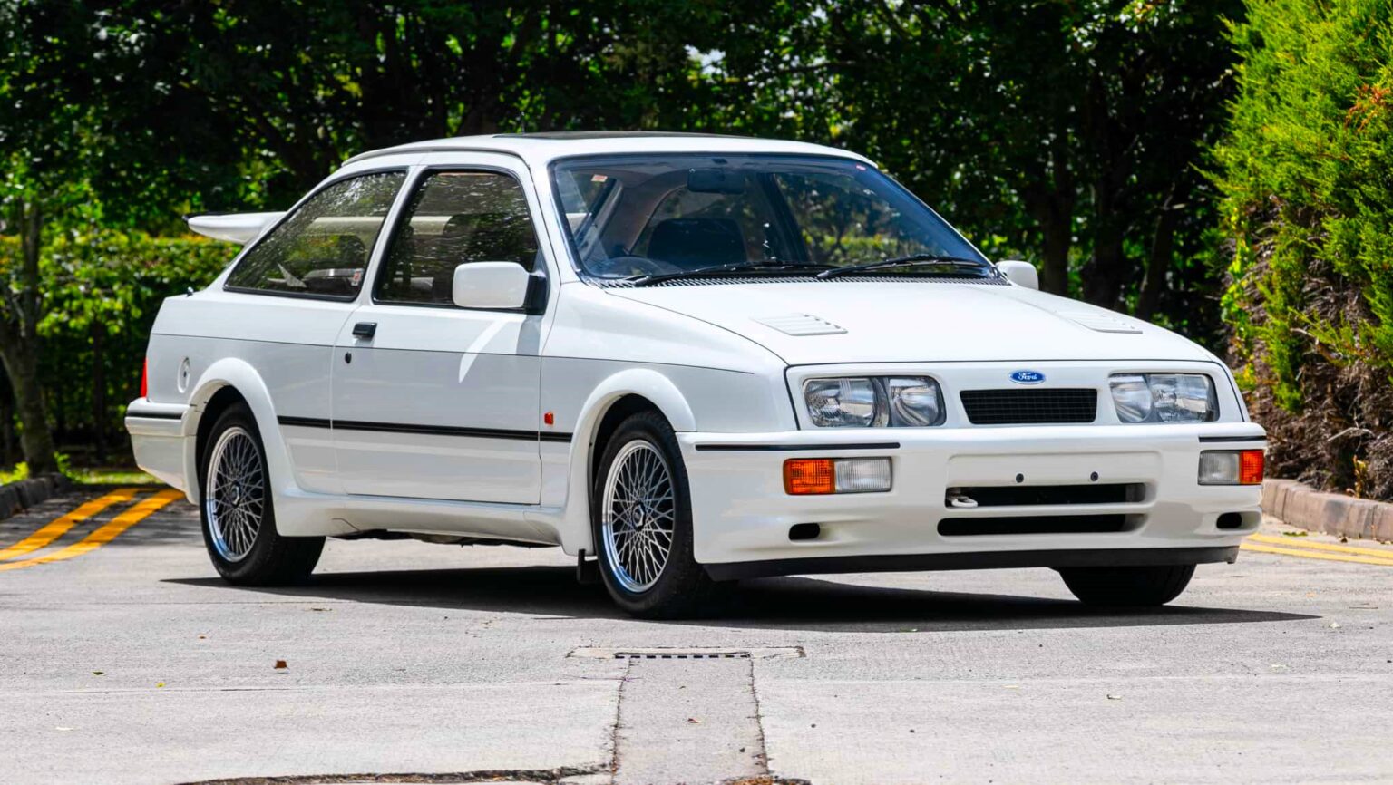 Iconic 1986 Ford Sierra Cosworth with just 27,742 miles hits auction for £95,000 - over double its original value - thanks to pristine condition and one cherished owner.
