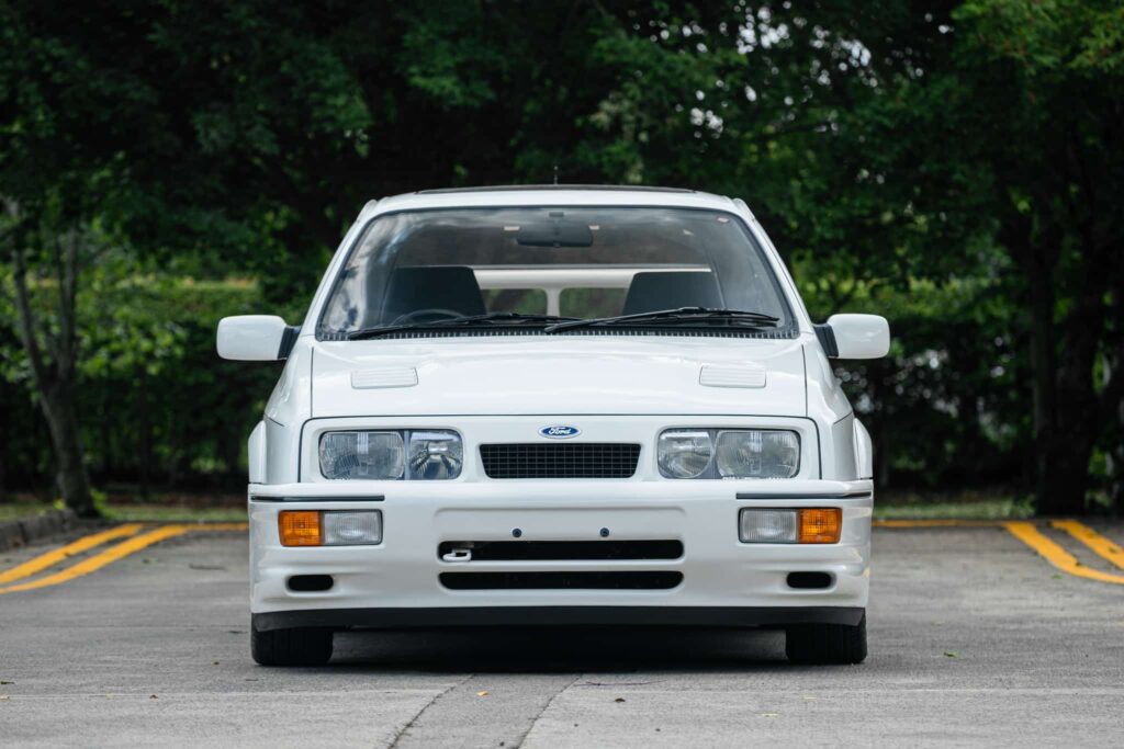 Iconic 1986 Ford Sierra Cosworth with just 27,742 miles hits auction for £95,000 - over double its original value - thanks to pristine condition and one cherished owner.