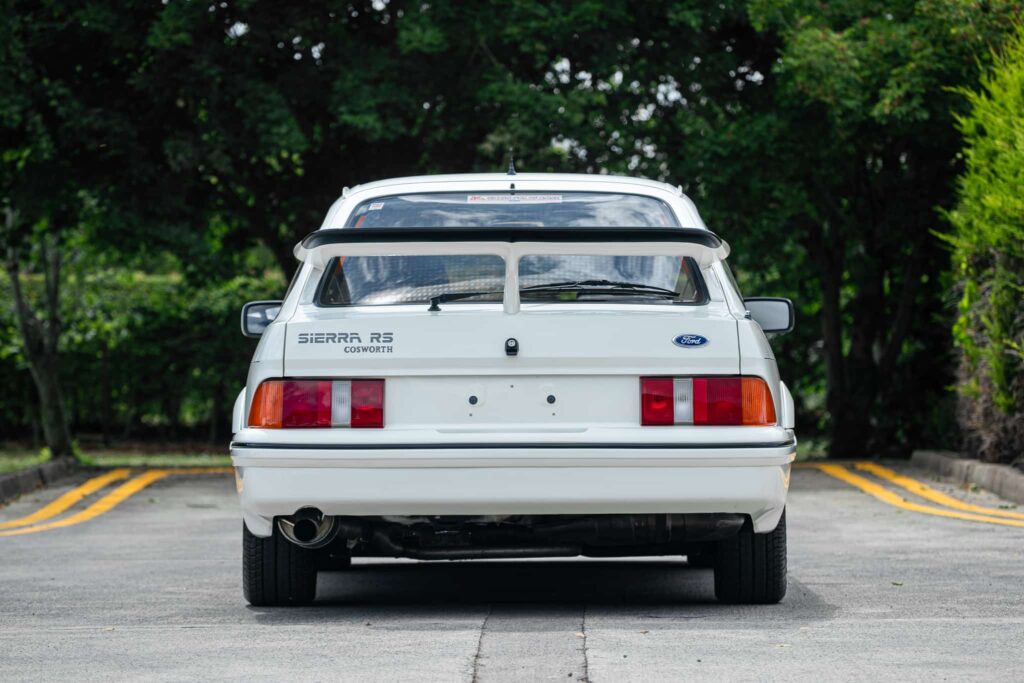 Iconic 1986 Ford Sierra Cosworth with just 27,742 miles hits auction for £95,000 - over double its original value - thanks to pristine condition and one cherished owner.