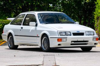 Iconic 1986 Ford Sierra Cosworth with just 27,742 miles hits auction for £95,000 - over double its original value - thanks to pristine condition and one cherished owner.
