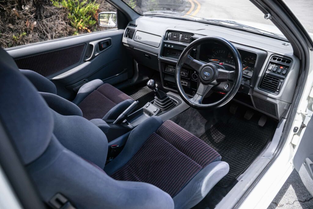 Iconic 1986 Ford Sierra Cosworth with just 27,742 miles hits auction for £95,000 - over double its original value - thanks to pristine condition and one cherished owner.