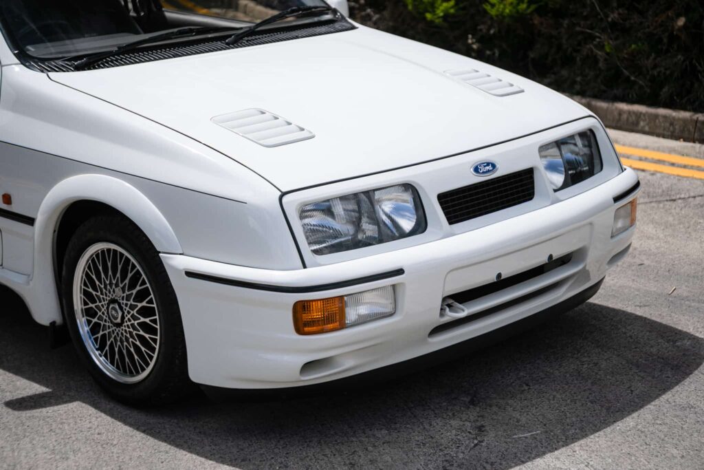 Iconic 1986 Ford Sierra Cosworth with just 27,742 miles hits auction for £95,000 - over double its original value - thanks to pristine condition and one cherished owner.