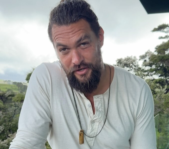 Jason Momoa joins moshpit with son at Ozzy Osbourne’s final Black Sabbath show, thrilling fans at Birmingham’s Villa Park and going viral for his heavy metal passion.