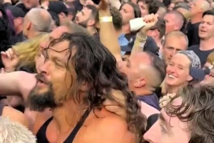 Jason Momoa joins moshpit with son at Ozzy Osbourne’s final Black Sabbath show, thrilling fans at Birmingham’s Villa Park and going viral for his heavy metal passion.