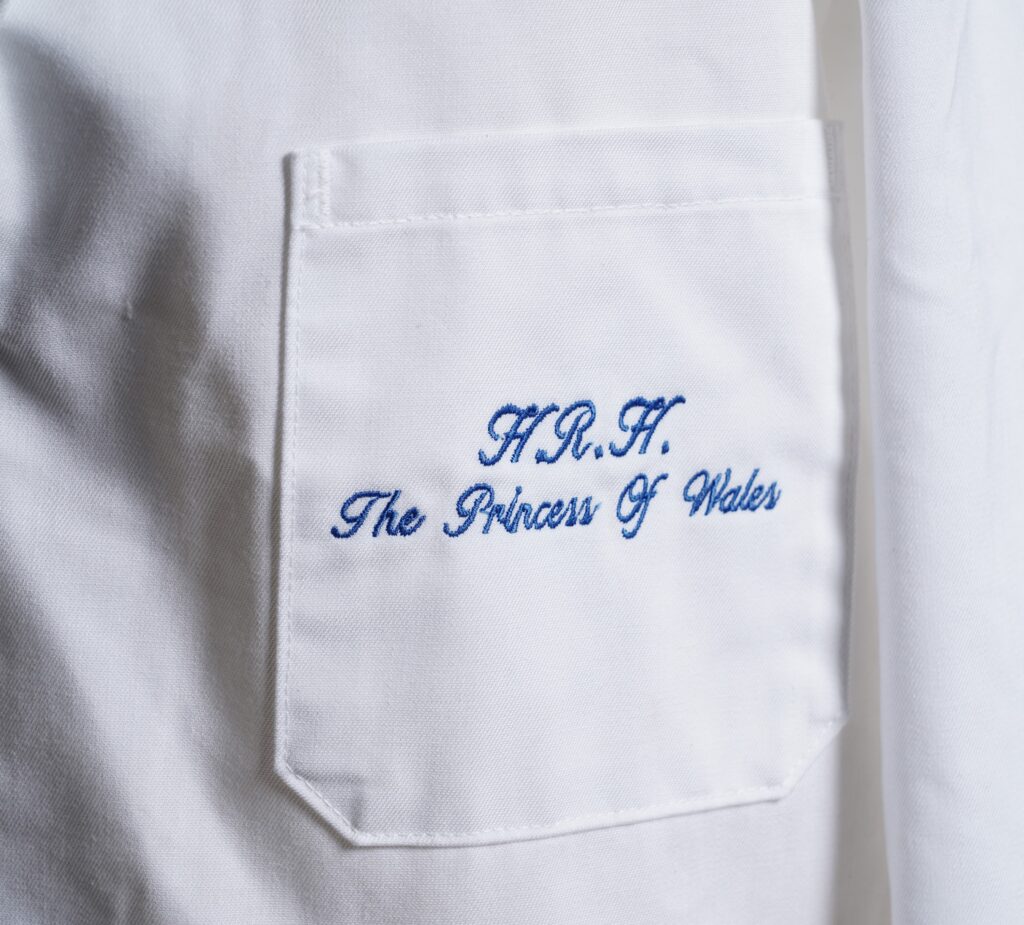 Princess Diana’s unwashed lab coat from a 1992 factory visit, left behind the day her separation was announced, has sold for £4,500 after decades hidden in a wardrobe.