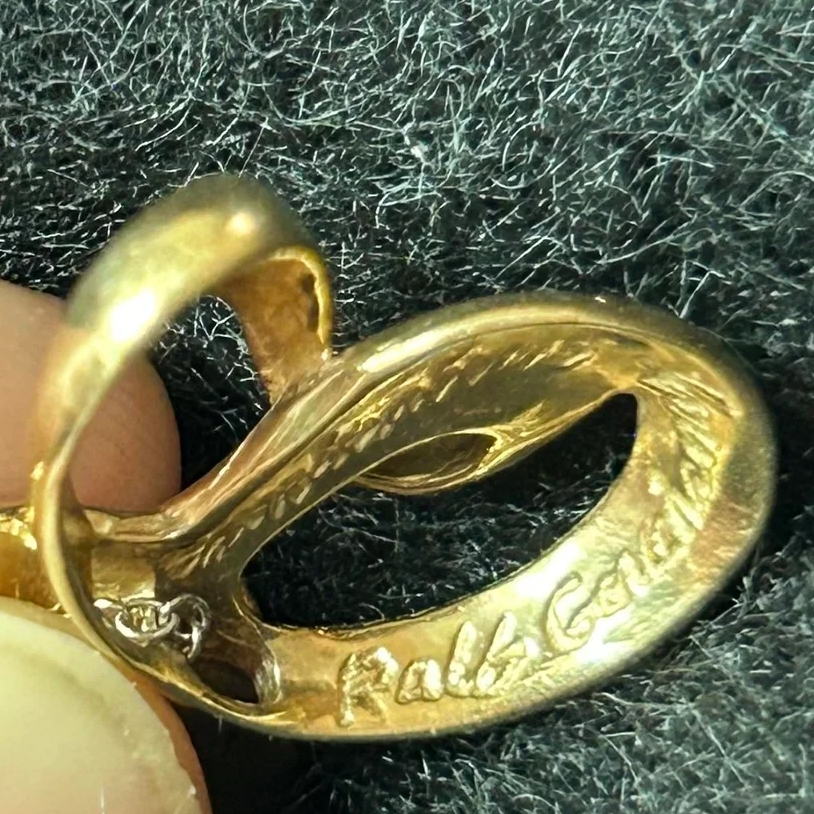A thrift shopper scored big after buying a $1 whale tail pendant, later revealed to be 14k gold worth over $340 and designed by Alaskan artist Ralph Gorichanaz.
