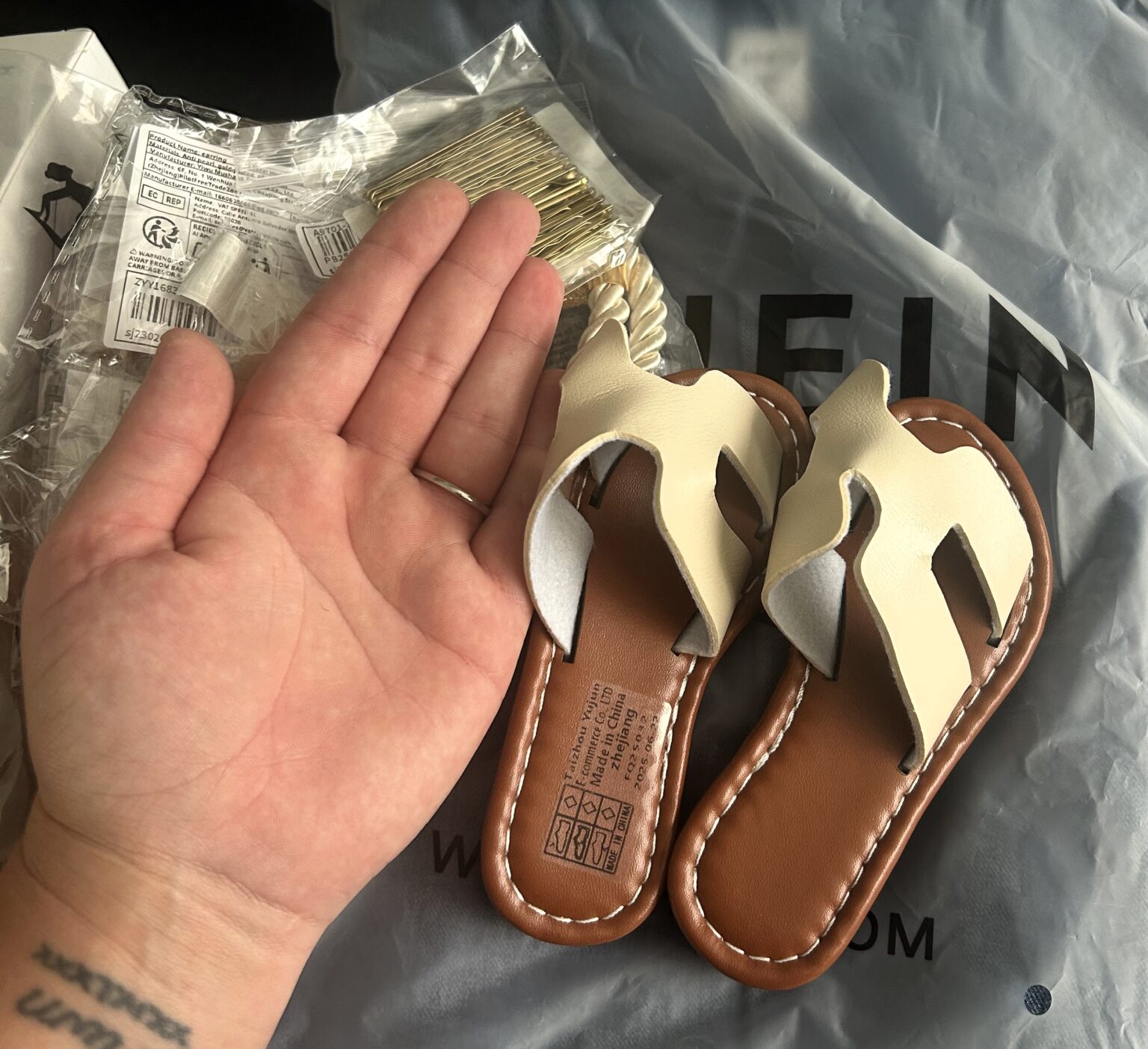 Mum left in stitches after £3 Shein sandals turn out to be toddler-sized - now her dog Kaya rocks them in a viral fashion twist that has the internet howling with laughter.