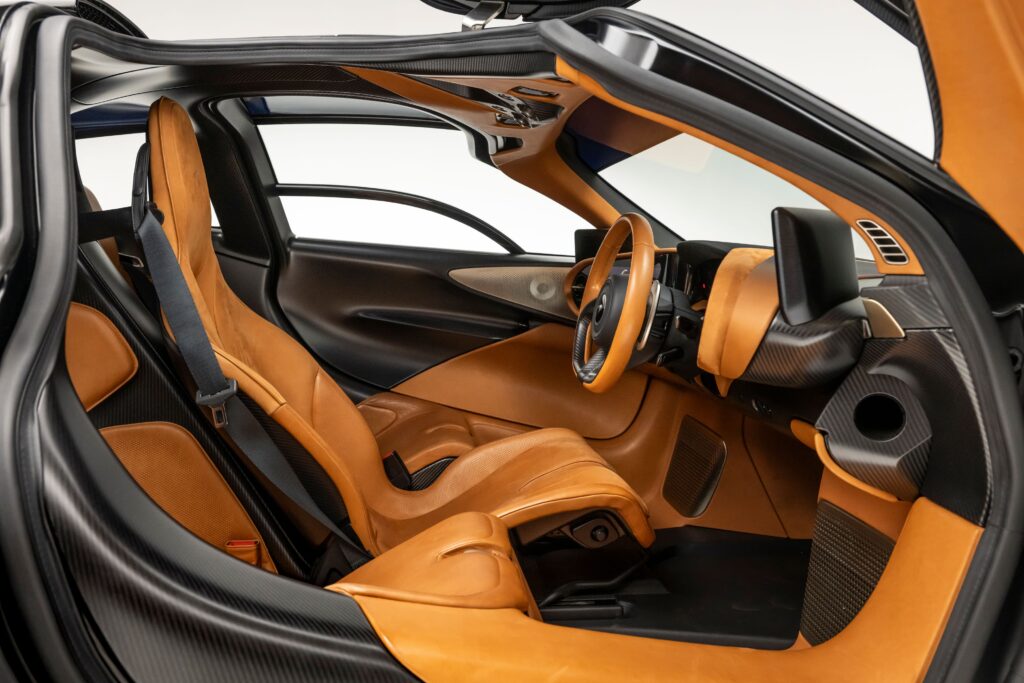 A rare 2020 McLaren Speedtail with just 71 miles, violet finish, £81k roof scoop and 250mph top speed is up for auction at £1.45m through RM Sotheby's.