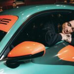A unique Porsche 911 GT3 RS designed by Dua Lipa is up for auction at £345,000, with vibrant colors, 184mph speed and proceeds supporting her Sunny Hill Foundation.