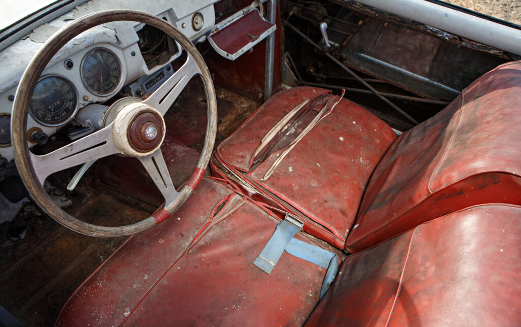 A rare 1952 Alfa Romeo 1900C Cabriolet hidden for 40 years is heading to auction. With original parts and rich history, it's a dream find for classic car collectors.