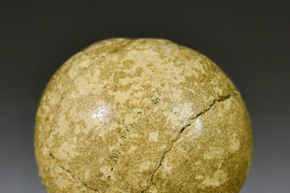 Historic 1800s golf ball once used by Ian Fleming expected to fetch £4,000 at Canterbury auction, tied to Bond and golf legend Old Tom Morris.