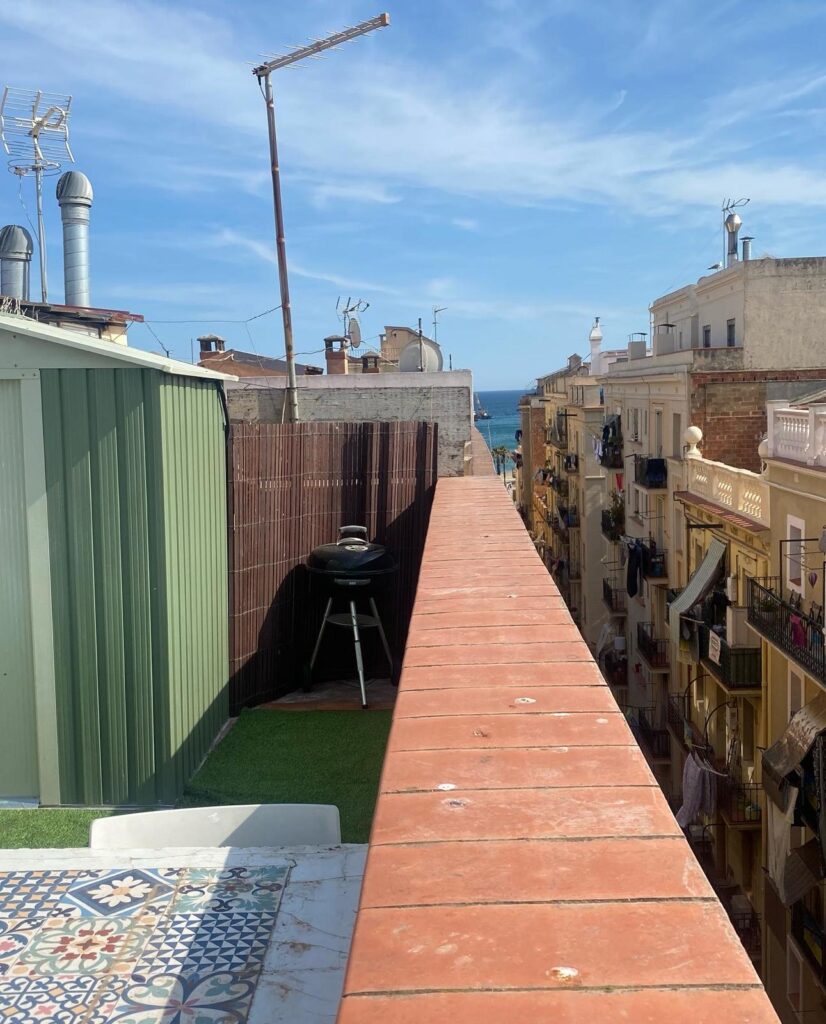 Tired of high rent, travel writer Karolina Wachowicz buys €180k beachfront flat in Barcelona, saying it's cheaper and easier than renting with monthly costs halved.