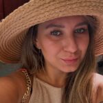 Tired of high rent, travel writer Karolina Wachowicz buys €180k beachfront flat in Barcelona, saying it's cheaper and easier than renting with monthly costs halved.