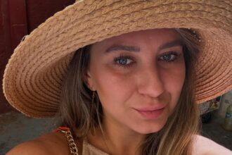 Tired of high rent, travel writer Karolina Wachowicz buys €180k beachfront flat in Barcelona, saying it's cheaper and easier than renting with monthly costs halved.