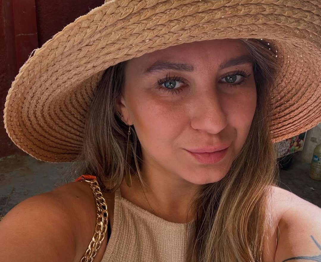 Tired of high rent, travel writer Karolina Wachowicz buys €180k beachfront flat in Barcelona, saying it's cheaper and easier than renting with monthly costs halved.